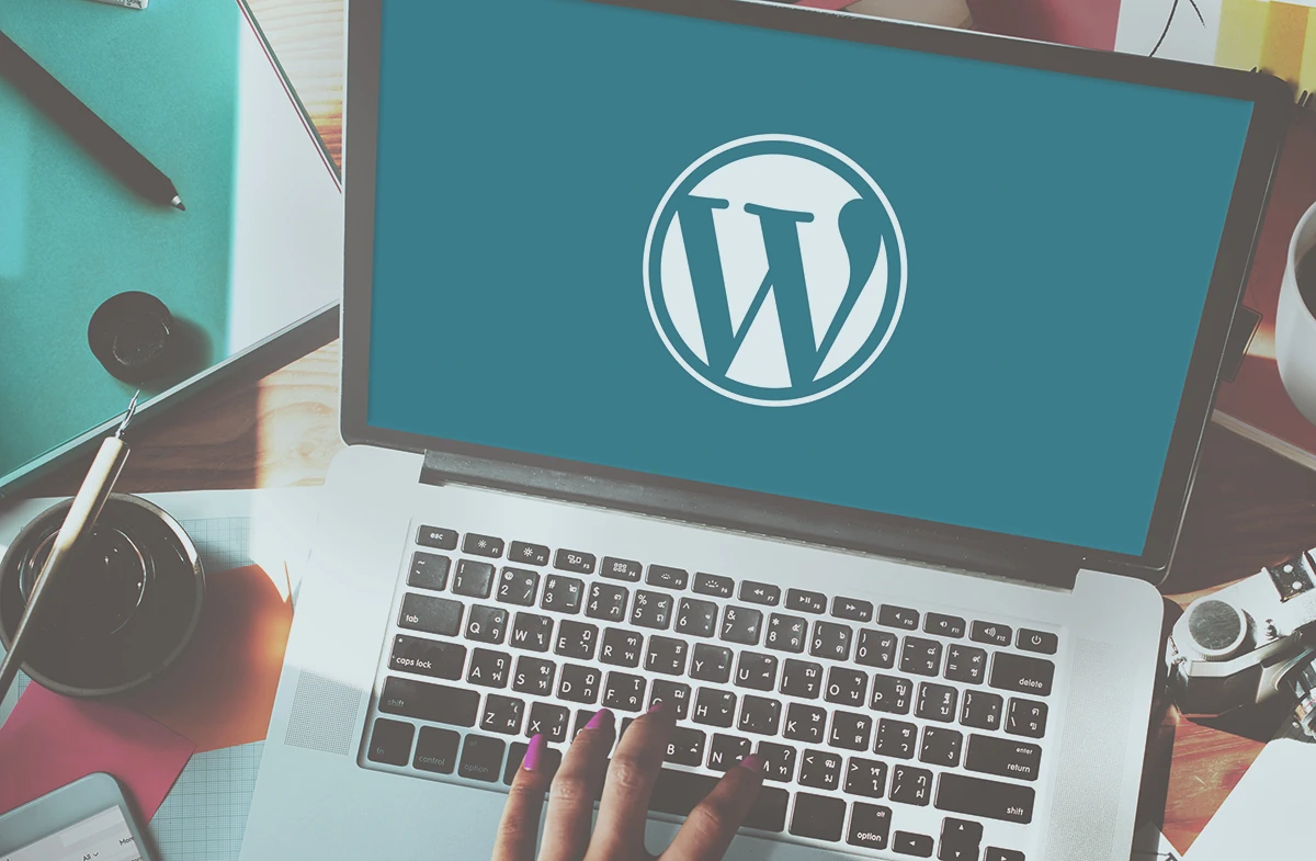 Professional WordPress website design on laptop screen by AI Core Mind | WordPress website development | Expert WordPress developer building a custom website at AI Core Mind | custom WordPress website | AI Core Mind WordPress development team collaborating on a project | WordPress development services | User-friendly WordPress dashboard used in website development services | WordPress website builder |